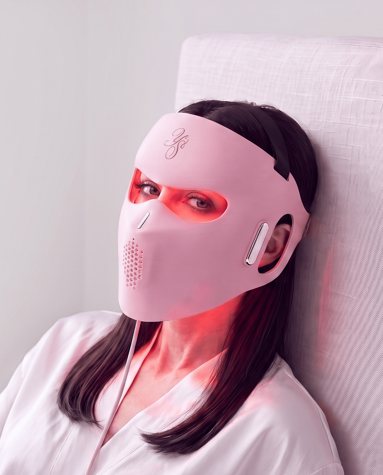 Woman wearing the 4D LED mask switched off, the soft silicone sitting flush on brow, cheekbone and jaw